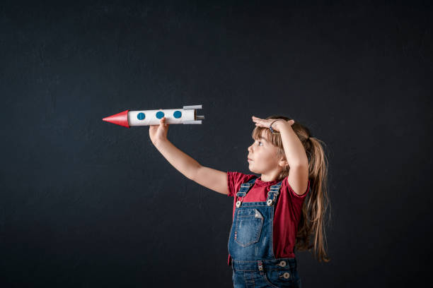 istock Young Business Girl with Rocket Pack 1304597596