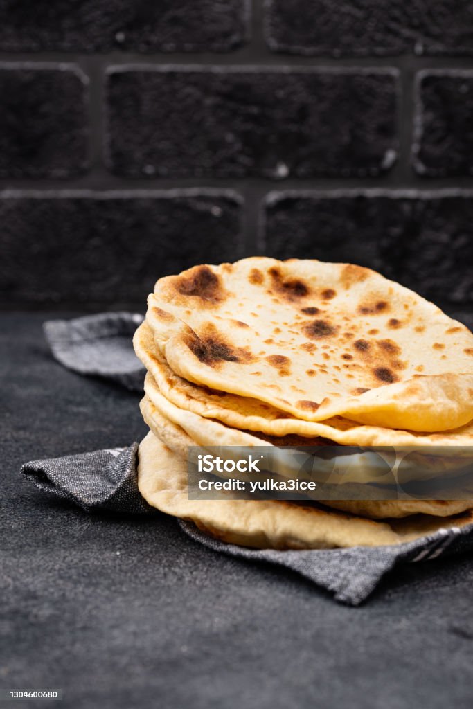 Pita bread, traditional Jewish food Pita bread, traditional Jewish and Israeli food Flatbread Stock Photo