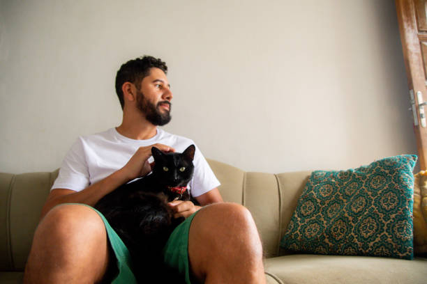 istock Man with his pet cat. 1304605071