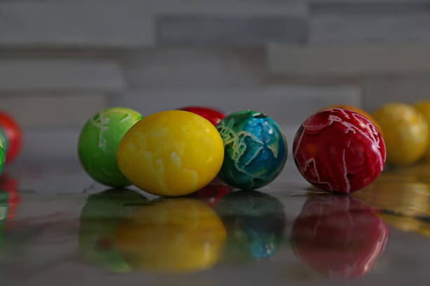 istock Painted Easter eggs waiting to dry and be arranged 1304605314