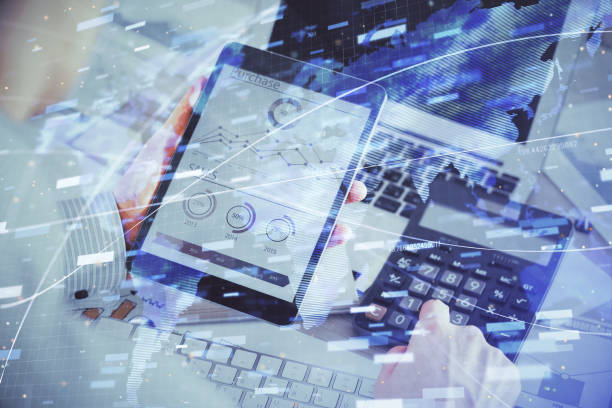 istock Double exposure of man's hand holding and using a digital device and data theme hologram drawing. Technology concept. 1304606113
