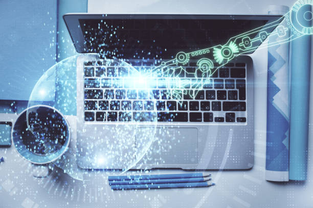 istock Multi exposure of data theme drawing hologram over topview work desk background with computer. Concept of technology. 1304606162