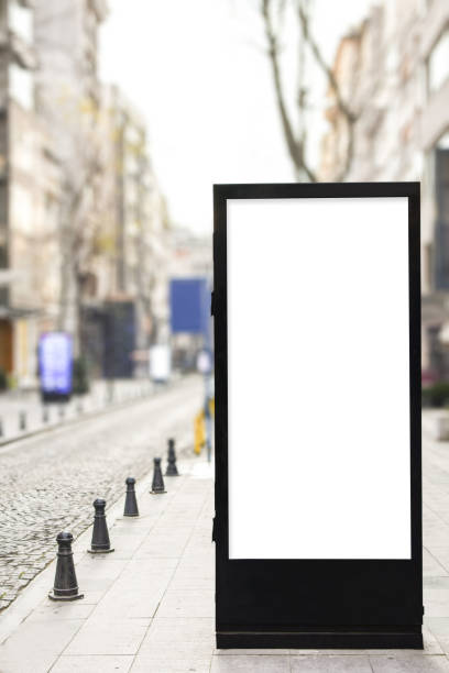 istock Blank billboard mock up, public information board with copy space on the street. 1304606981