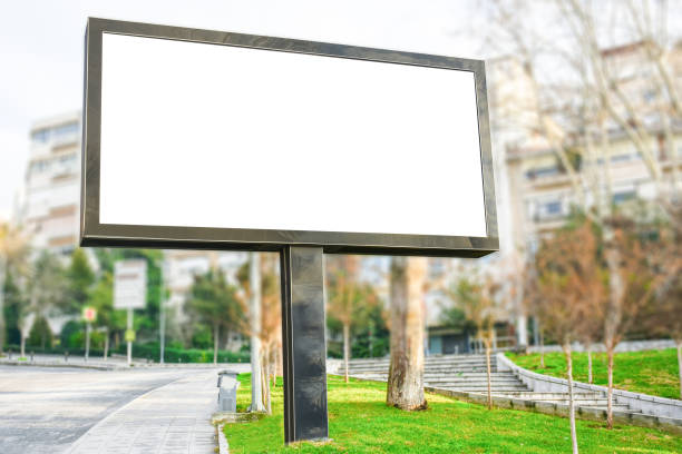 istock Blank billboard mock up, public information board with copy space on the street. 1304606997
