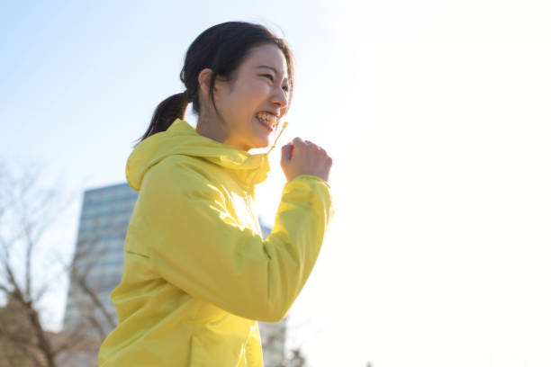 istock Woman running in city 1304607870