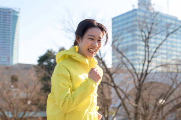 Woman running in city