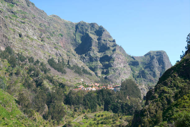 istock mountain range village madeira island 1304608778