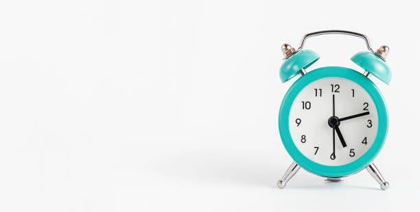 istock Turquoise alarm clock on white background. Banner, copy space. 1304608841