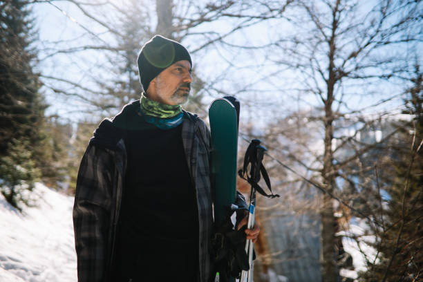 istock Active older man skiing on the mountain top 1304611167