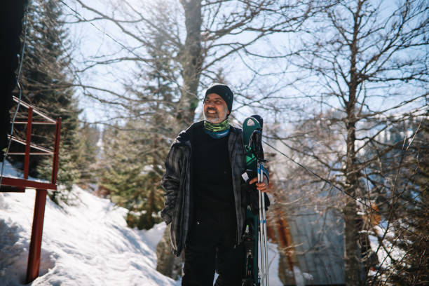 istock Active older man skiing on the mountain top 1304611201
