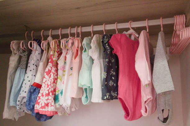 istock wardrobe with children's clothes for girl 1304611766