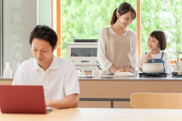 istock young japanese family relaxing in kitchen 1304611923