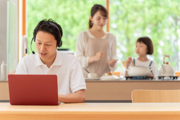 istock young japanese family relaxing in kitchen 1304611943
