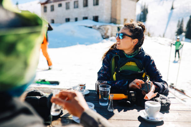 istock Young people having a break from skiing on the mountain 1304614830