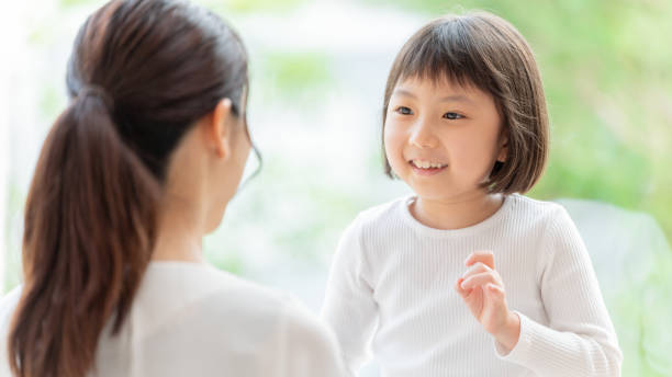 istock young japanese mother and daughter playing 1304615026