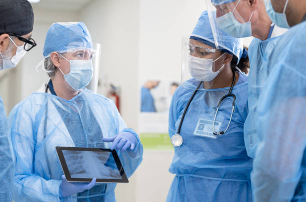 istock Preparing for Surgery Meeting Stock Photo 1304619661