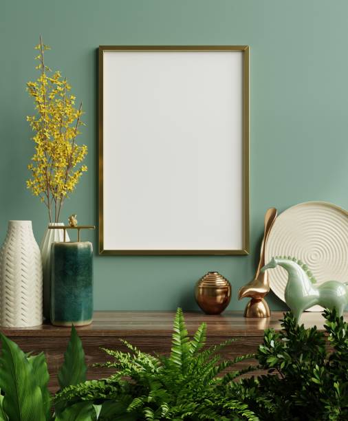 istock Mockup photo frame on the green shelf with beautiful plants. 1304620839