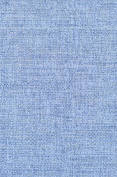 istock Natural light pastel pale blue rustic flax fiber linen fabric swatch texture pattern, vertical bright rough detailed vintage textile background macro closeup, crumpled textured burlap canvas copy space wallpaper 1304622618