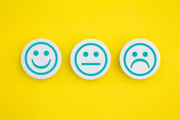 Customer Feedback Customer feedback icons on a yellow background. anthropomorphic face photos stock pictures, royalty-free photos & images