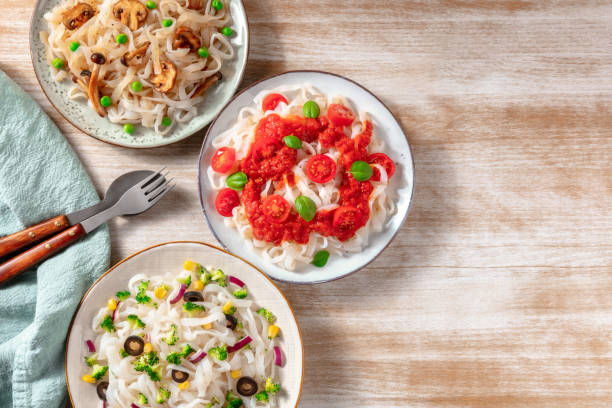 istock Konjac pasta with various vegetables, shot ftom the top with a place for text 1304648886