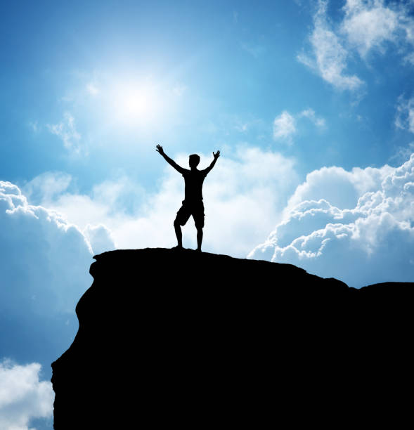 istock Man on top of mountain. 1304653143