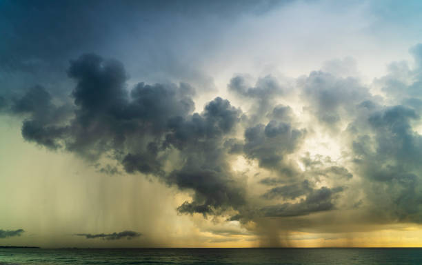istock Dramatic sky with massive rain clouds over the Indian Ocean on the scenic sunset in Hikkaduwa, Sri Lanka, in the winter season. 1304657021