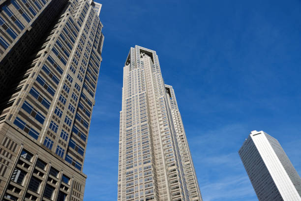 istock Low angle view of skyscrapers against blue sky 1304658194