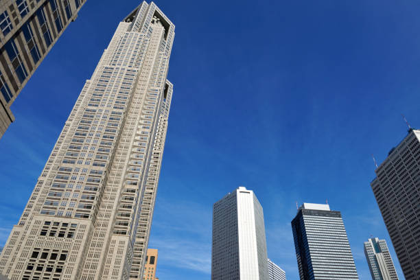 istock Low angle view of skyscrapers against blue sky 1304658212