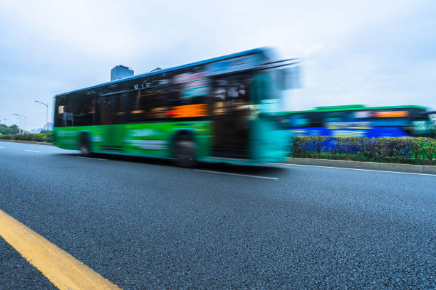 istock Car driving on road in city 1304658628