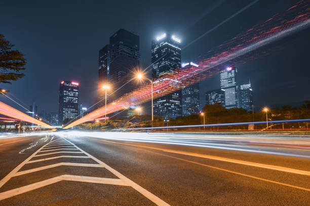 istock Busy traffic at night in downtown Shenzhen 1304658650