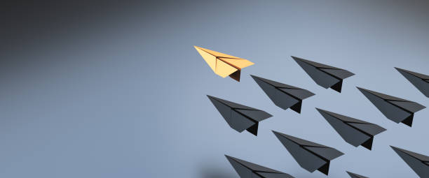 istock Leadership concept, yellow leader plane leading black planes, on black background with empty copy space on left side 1304659500
