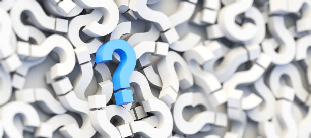 istock Blue question mark on a background of white signs, FAQ Concept 1304659542