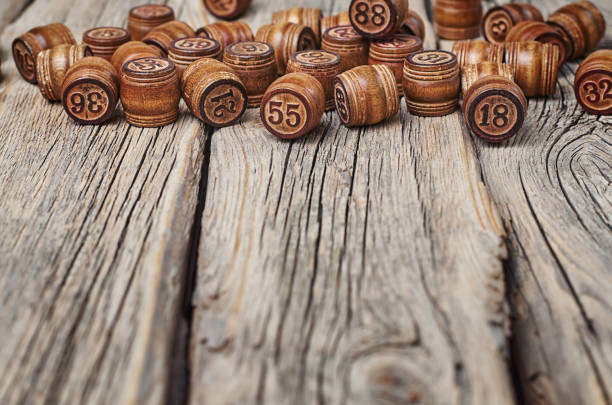 istock barrels with numbers on an old cracked wooden background 1304662717