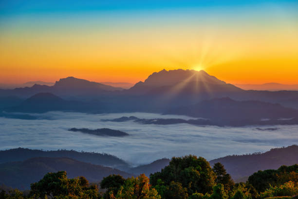 istock Tropical forest nature landscape view with mountain range sunrise with moving cloud mist at Huai Nam Dang National Park, Chiang Mai Thailand 1304662885