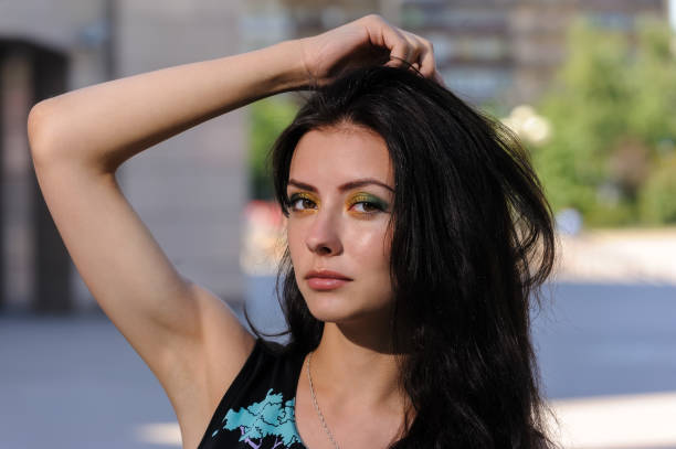 istock Beautiful girl over urban background 1304664204