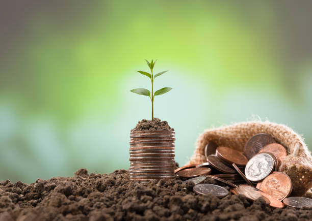 istock Metal coins on sack. 1304669576