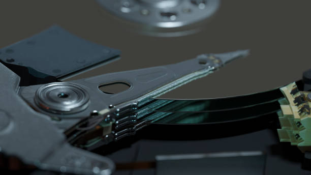 istock Close-up on a modern HDD or Hard Disk Drive with shallow depth of field. Information storage concept. 1304669594