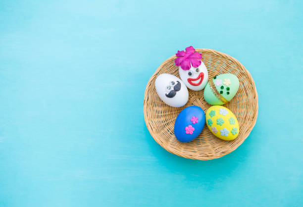 Six eggs painted in different colors for Easter