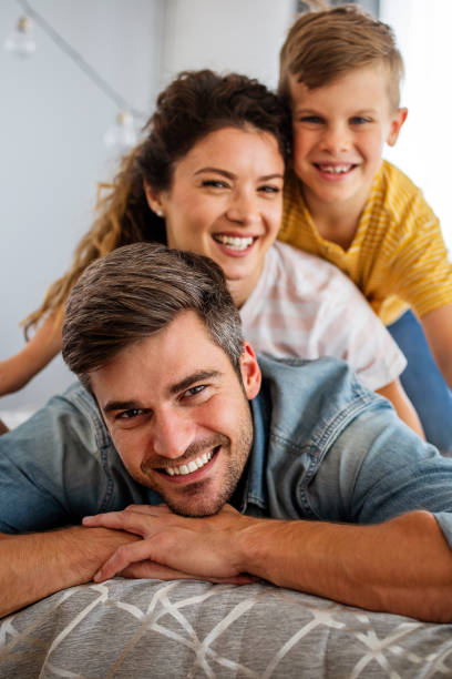 istock Happy family having fun time at home 1304672470
