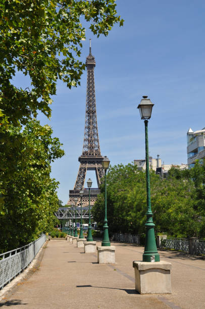 istock Paris, promenade along the Seine river with the Eiffel tower in background. 1304673014