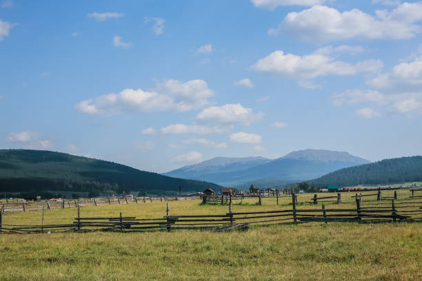 istock landscape with an old village in a valley surrounded by mountains 1304673103