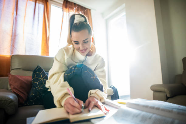 istock Beautiful young women studying from home 1304674969