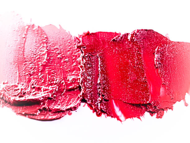 istock Red lipstick smear smudge on white, women's lips, love background, cosmetics composition, make up composition, lipstick brush strokes 1304676301