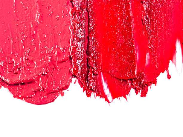 istock Red lipstick smear smudge on white, women's lips, love background, cosmetics composition, make up composition, lipstick brush strokes 1304676422