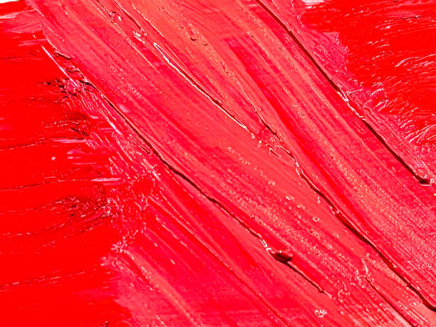 istock Red lipstick smear smudge on white, women's lips, love background, cosmetics composition, make up composition, lipstick brush strokes 1304676493