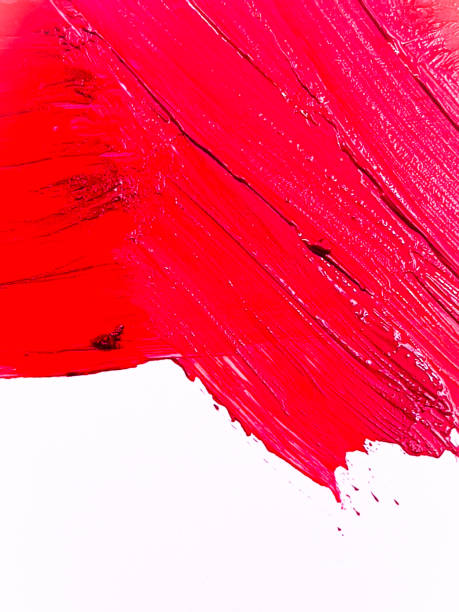 istock Red lipstick smear smudge on white, women's lips, love background, cosmetics composition, make up composition, lipstick brush strokes 1304676521