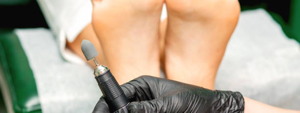 istock Chiropodist prepares foot file machin 1304677785