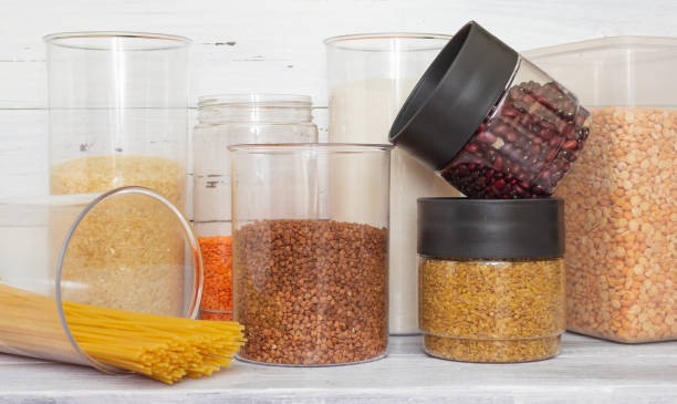 istock Zero-waste storeroom. Breakfast items, preserved in a resealable plastic jars, cereals, pasta. Banks can be filled several times with bulk products. Plastic. 1304679033