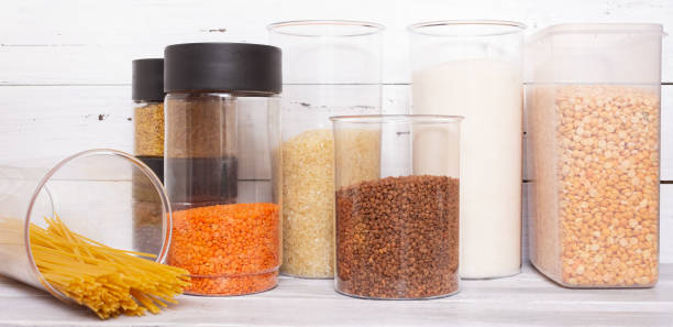 istock Zero-waste storeroom. Breakfast items, preserved in a resealable plastic jars, cereals, pasta. Banks can be filled several times with bulk products. Plastic. 1304679038