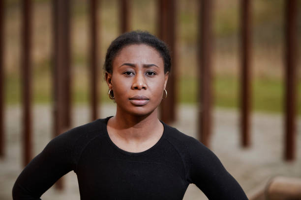 istock Outdoors portrait with young woman looking away 1304680441
